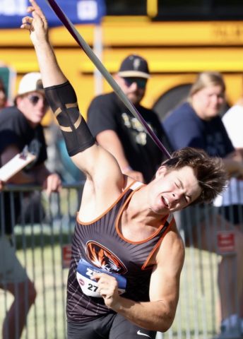 Douglas Wins Javelin Medal