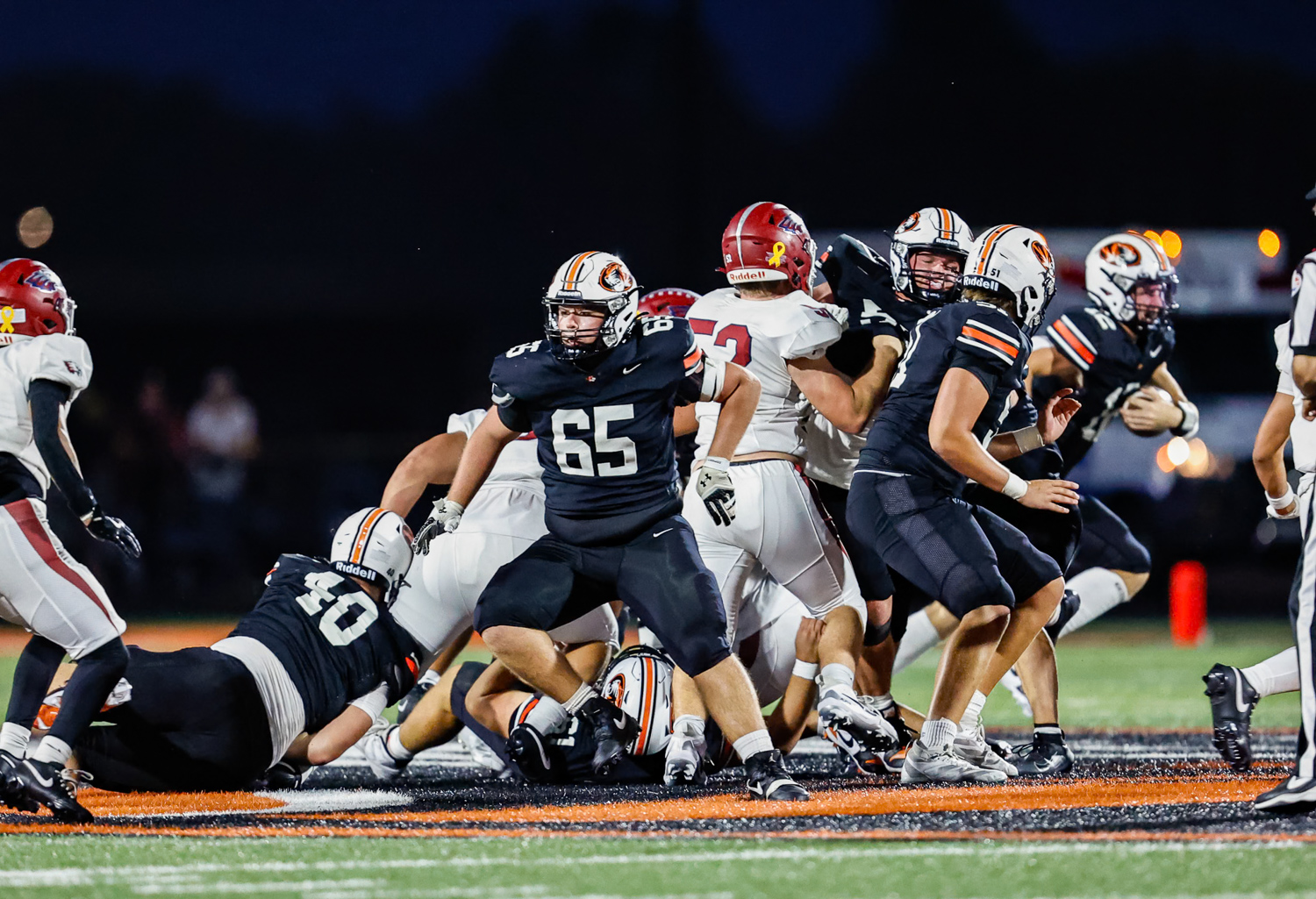 Eleven Football Tigers Named All-COC West