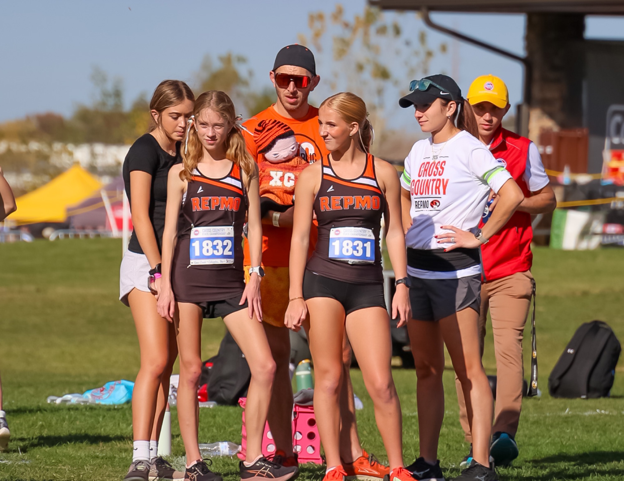 Zoey Johns and Brylie Harris wait near the start line at the state cross country meet