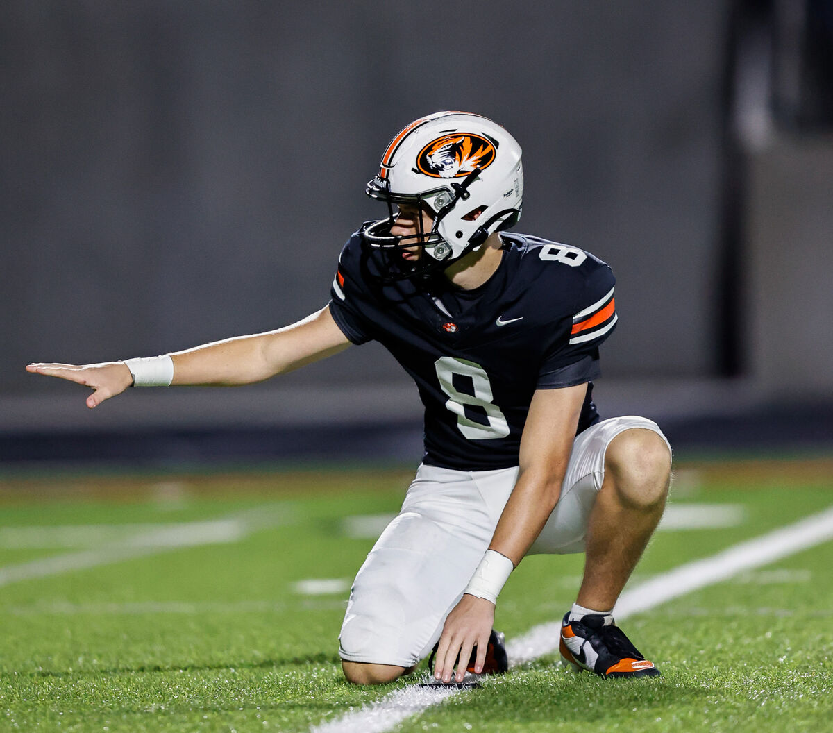 Brennan Overstreet holds for a placekick