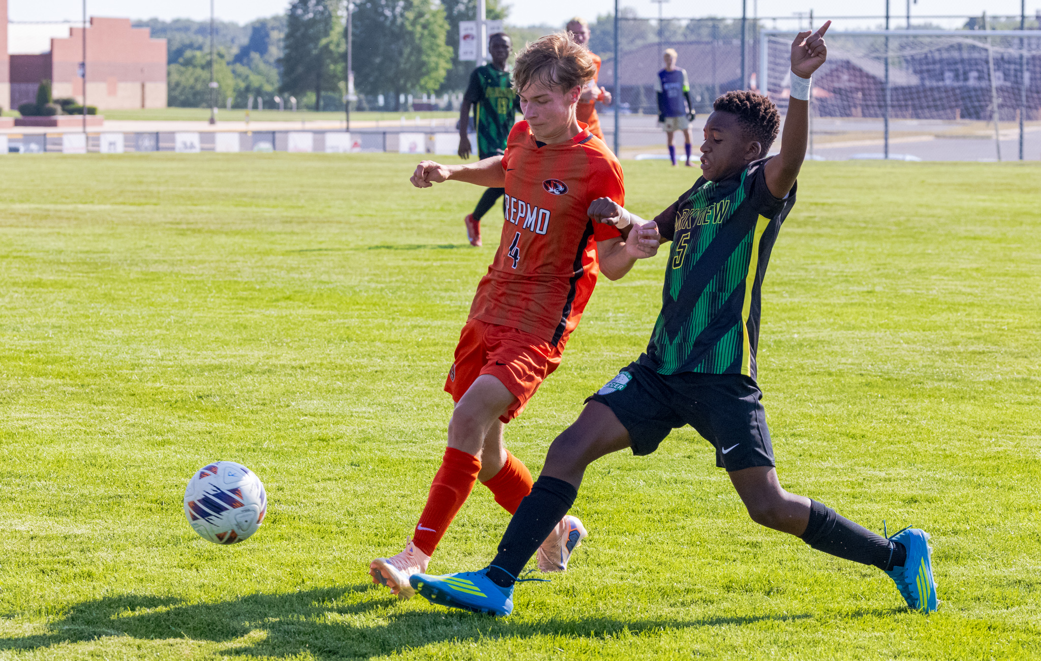 Dylan Garrison battles a Parkview player for the ball