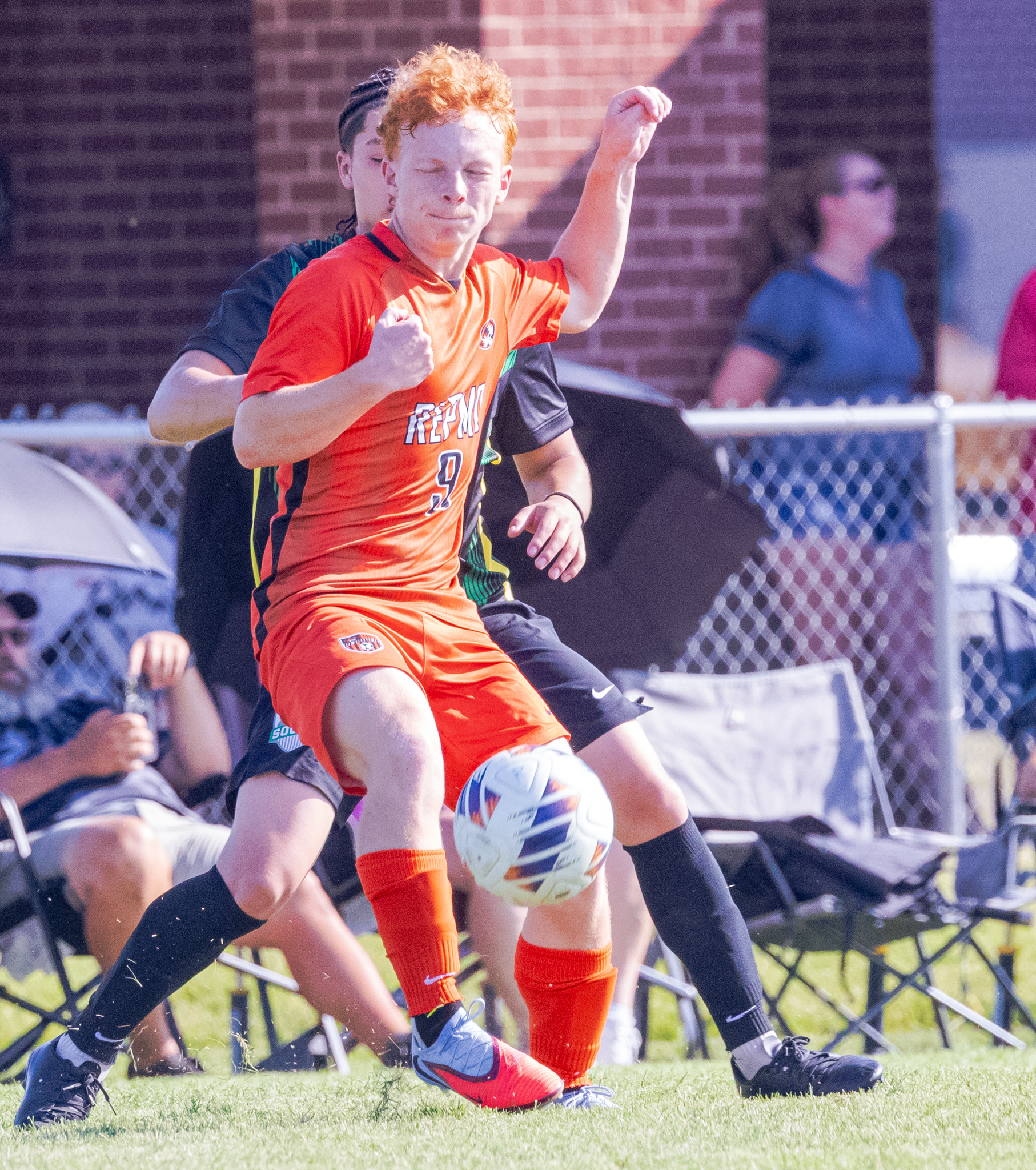 Logan Renkoski shields the ball from a defender