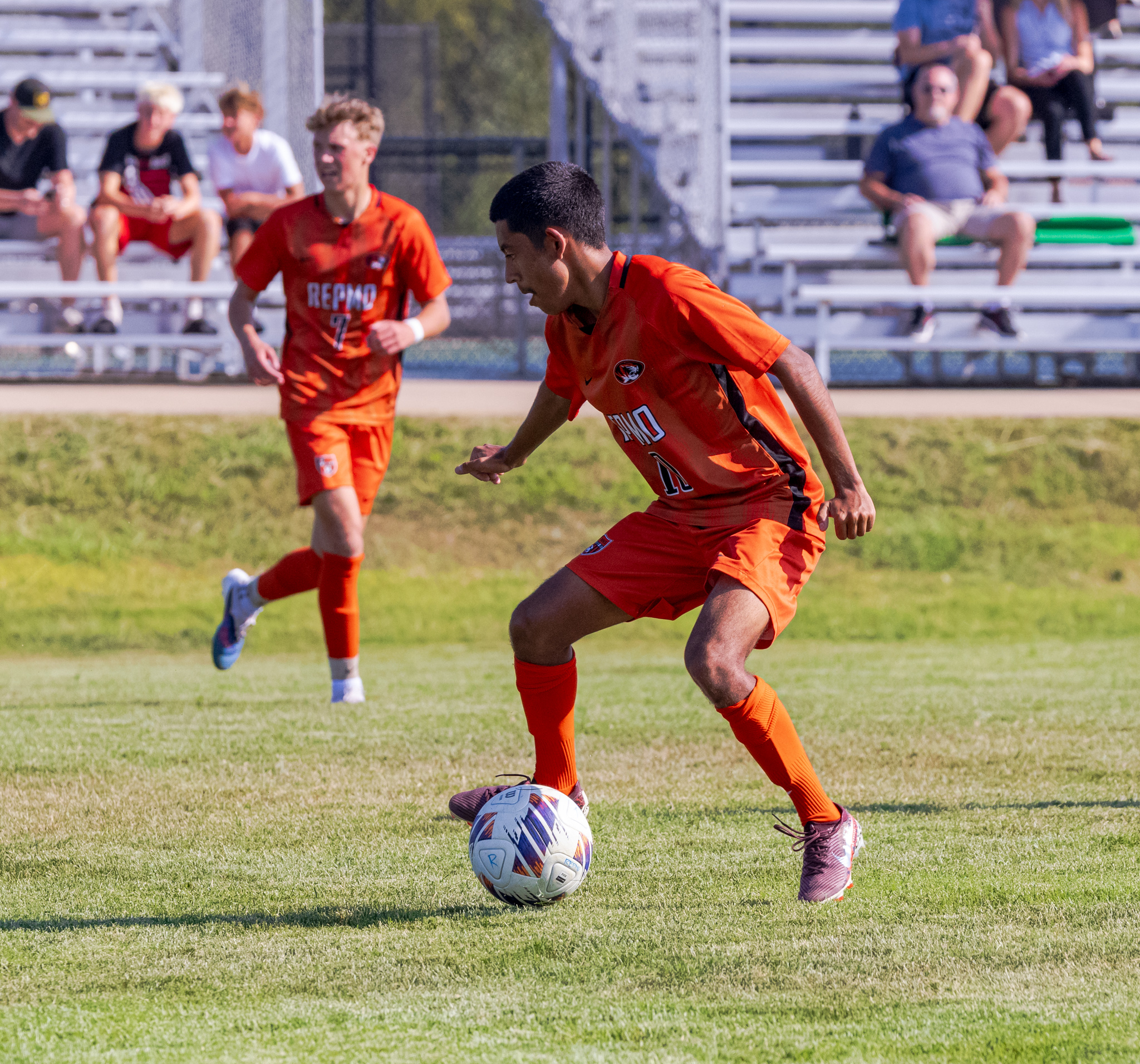 Adiel Urquiza dribbles up the field