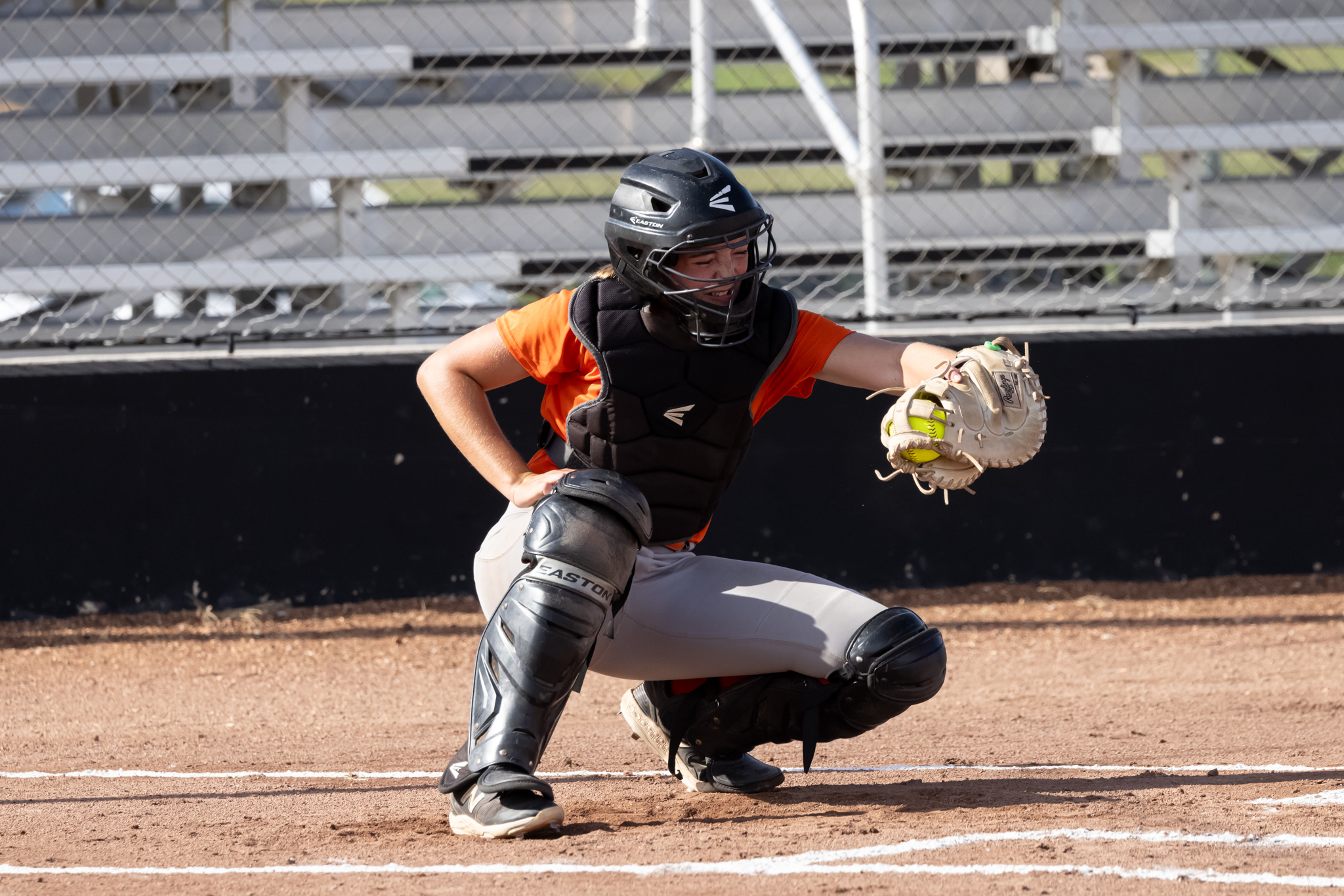 Maddie Carter frames a pitch behind the plate