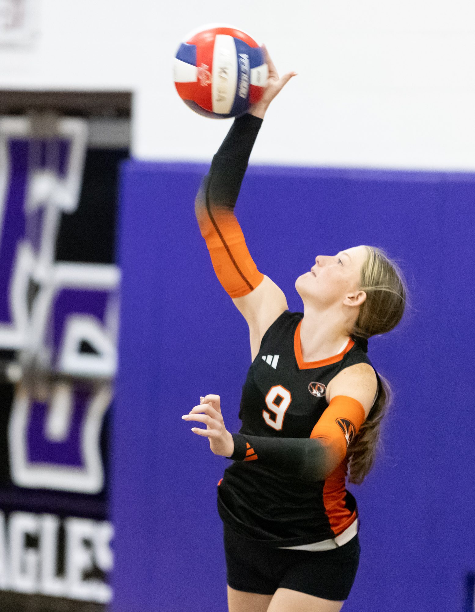 Addyson Warner serves